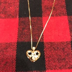 Gold  necklace, with moon, star and heart.